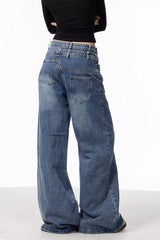 Jean à jambes larges et boutons asymétriques