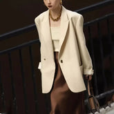 Blazer matelassé décontracté, ample et confortable, idéal pour les trajets domicile-travail. Élégant et confortable.