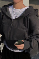 Sweat à capuche court zippé doublé en polaire