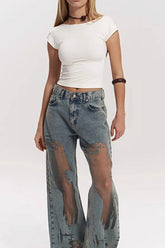 Jean large texturé à découpes