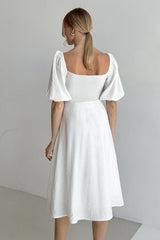 Robe midi en coton à épaules dénudées et manches bouffantes