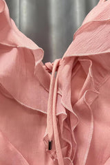 Robe courte asymétrique à volants