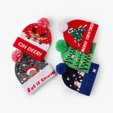 Bonnet de Noël tricoté avec des rennes à LED