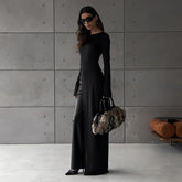 Robe unie à col rond et manches longues, fente asymétrique irrégulière