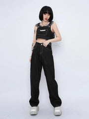 Pantalon décontracté en denim blanc à coutures apparentes et poches bavette ajustables