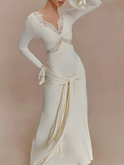 Robe longue drapée à nouer sur le devant