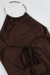 Robe mini dos nu à anneaux métalliques