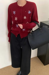 Gilet de Noël tricoté à motif neige