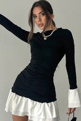 Robe courte à taille volantée et col rond