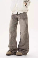 Jean ample et usé jusqu'au sol