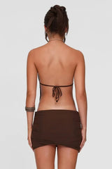 Robe mini dos nu à anneaux métalliques