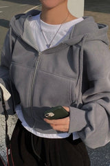 Sweat à capuche court zippé doublé en polaire