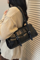 Sac à main long rétro en cuir ciré, élégant, porté épaule ou sous le bras, idéal pour les trajets quotidiens.