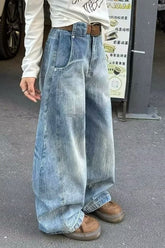 Jean large à coupe cintrée et effet usé