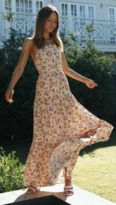 La liste continue Robe midi à franges et volants fleuris