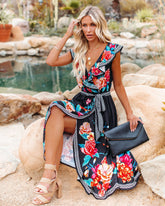 Robe longue Leander à volants asymétriques et fleuries