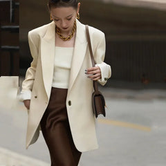 Blazer matelassé décontracté, ample et confortable, idéal pour les trajets domicile-travail. Élégant et confortable.