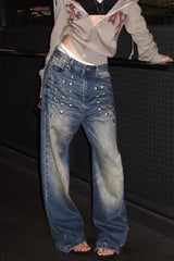 Jean large délavé clouté