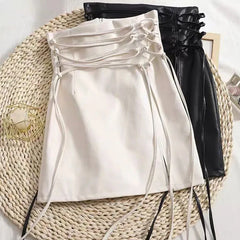 Mini-jupe noire sexy moulante à taille haute gothique et lacets