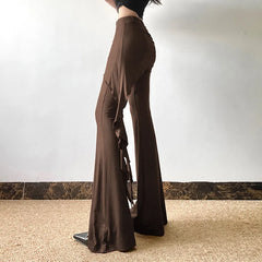 Pantalon décontracté à jambes larges et taille mi-haute unie