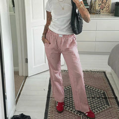 Pantalon de pyjama rétro confortable à jambes larges et taille élastique, à carreaux et rayures.