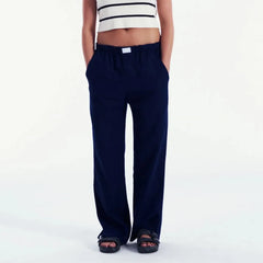 Pantalon de pyjama rétro confortable à jambes larges et taille élastique, à carreaux et rayures.