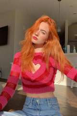 Pull à découpes et motif cœur contrasté