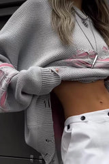 Pull contrasté à effet usé