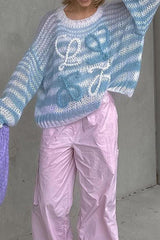 Pull jacquard ajouré à rayures contrastées