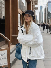 Manteaux longs en velours côtelé, amples, unis, avec poches et fermeture éclair, coupe oversize.