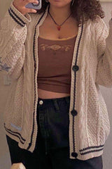 Gilet en maille brodé d'une étoile à cinq branches