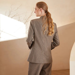 Blazer élégant et luxueux en laine australienne à motif pied-de-poule, idéal pour le travail.