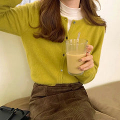 Gilet cardigan ample à manches longues en maille, simple, élégant, confortable et stylé.