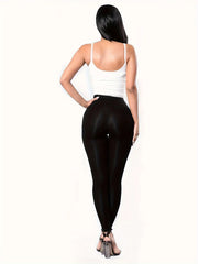 Leggings noirs moulants et sexy pour femmes, avec patchwork et laçage à neuf points sur le devant.