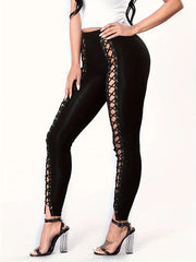 Leggings noirs moulants et sexy pour femmes, avec patchwork et laçage à neuf points sur le devant.
