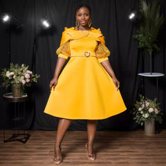 Robe de soirée transparente à manches lanternes et nœud papillon, taille cintrée