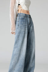 Jean large vintage à plis délavés