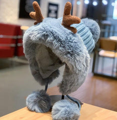 Bonnet de Noël à pompons et bois de renne