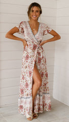 Robe maxi asymétrique à poches et nœud papillon, fabriquée par Sun 