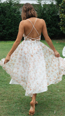 Robe midi smockée à fleurs mélancoliques