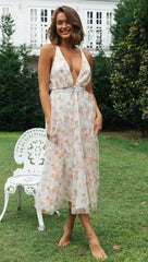 Robe midi smockée à fleurs mélancoliques